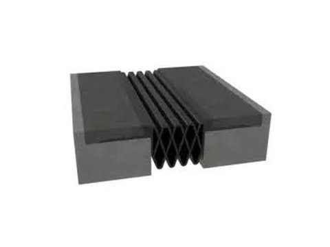 Nystrom expansion joint with a bellows seal between two slab edges